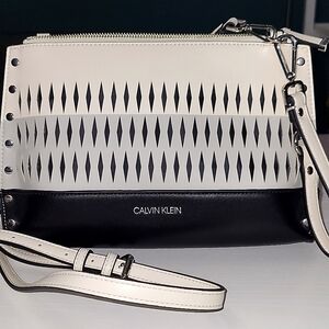 Calvin Klein Crossbody Leather Convertible Wristlet Purse Tote. New without tag